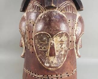 Lot 332  Vintage African carved wood four faced helmet mask