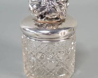 Lot 435  Antique crystal jar with silver hallmarked lid