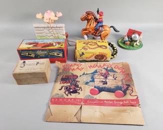 Lot 432  Group of vintage mechanical toys