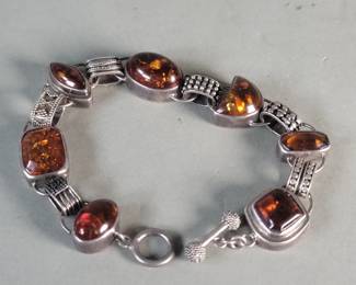 Lot 543  Vintage silver and amber bracelet
