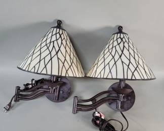 Lot 459  Stained glass and metal swing arm sconces