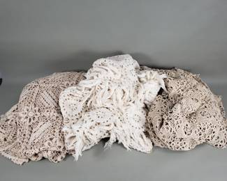 Lot 380  Group of vintage crocheted lace table cloth