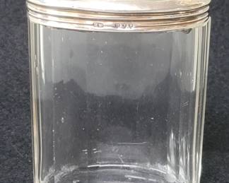 Lot 416  Vintage glass jar with silver hallmarked lid