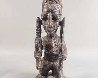 Lot 217  Vintage carved wood tribal sculpture