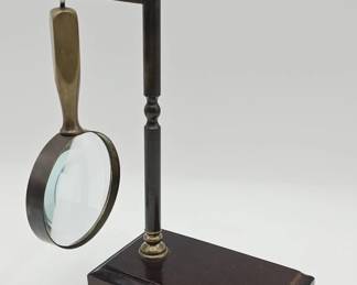 Lot 447h  Vintagestyle brass magnifying glass on wood and