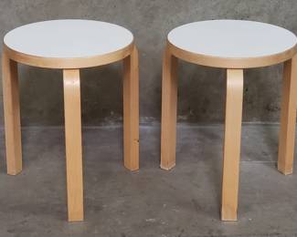 Lot 107  Pair of Alvar Aaltostyle birch wood stools