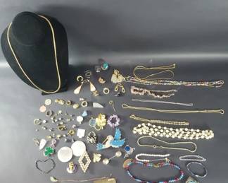 Lot 94  Costume jewelry, some vintage brooches,
