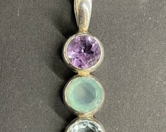 124  Lot 600h  Sterling silver pendant with multistones