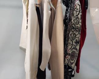 Lot 120  Group of womens vintage clothing, tops, pants,