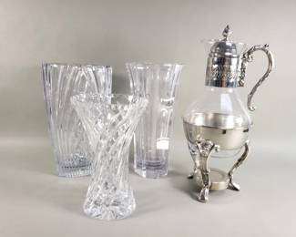 Lot 590  Three glass vases, and carafe