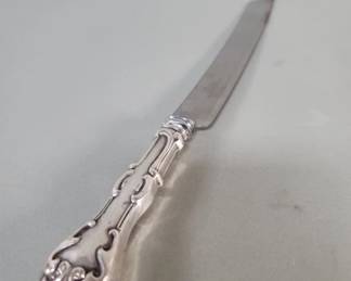 043  Lot 448  Sterling silver handle English carvings knife