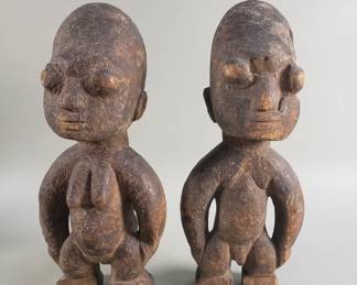 Lot 208  Pair of carved wood tribal figures