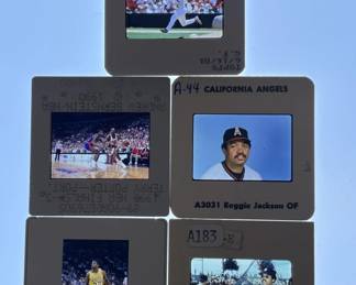 Lot 419h  Lot of sports film slides Magic Johnson, Reggie