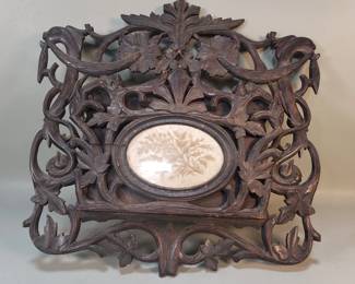 Lot 582  Antique carved wood wall pocket
