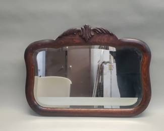 Lot 550  Antique carved wood mirror