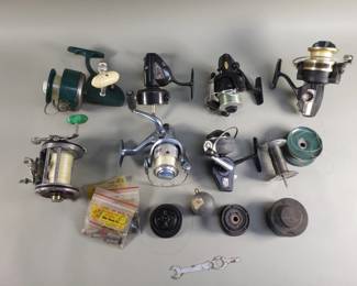 Lot 319  Group of vintage fishing reels and accessories