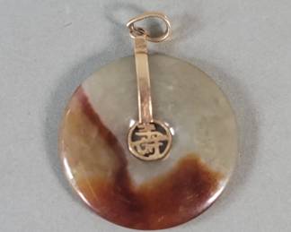 021  Lot 621  Jade and 14k gold pendant