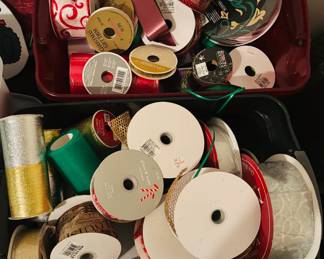 Bins of holiday and party ribbon for crafting