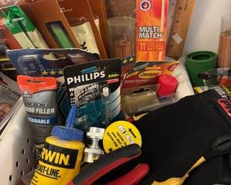 Bins of adhesives, clips, clamps, sanding blocks & more