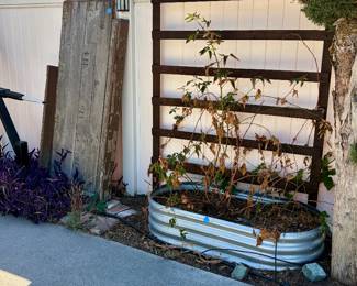 Metal trough, wood trellis, salvage wood piece for project