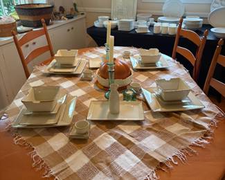 Dinning room table and chairs and pottery barn dishes  