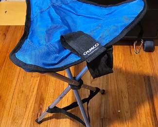 Portable 3-legged folding tripod camping stool.