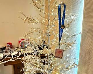 Pre-lit white Christmas tree.