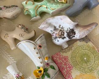 Antique little porcelain shoes