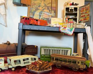 lincoln logs, tin toys, little metal fridge