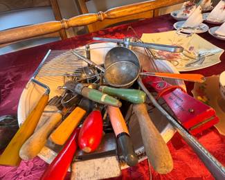 assorted kitchen utensils with colored wood handles