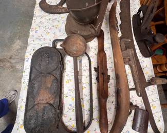 assortment of antique tools, rare pancake griddle,
