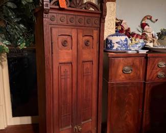 #31 . $400 early American cabinet