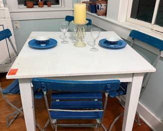 #42. $250 table with 4 folding chairs