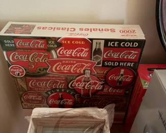 Coca-Cola Sign Classics puzzle and boxed Coca-Cola collectibles