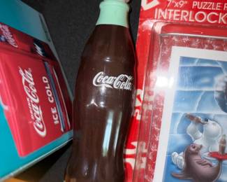 Coca-Cola glass bottle and Coca-Cola racing collectible