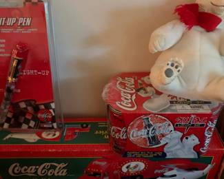 Coca-Cola polar bear plush on boxed Coca-Cola collectibles