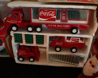 Coca-Cola toy truck set with tractor trailer, pickup and forklift