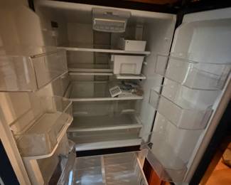 Whirlpool French door refrigerator, clean interior with bottom freezer drawer