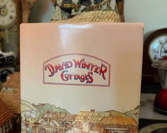 David Winter Cottages collectible with antique clocks