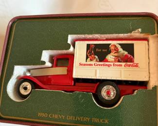 Coca-Cola 1930 Chevy delivery truck with Santa graphics in collector tin