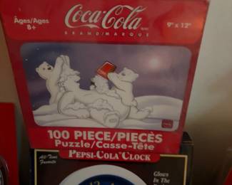 Coca-Cola polar bear 100 piece puzzle and Pepsi-Cola clock