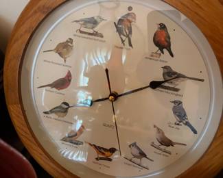 Singing bird wall clock with a different bird at each hour