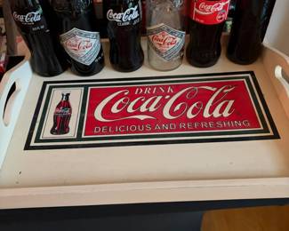 Coca-Cola glass bottles with Coca-Cola serving tray