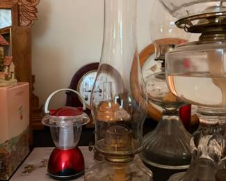 Antique glass oil lamps and hurricane lamps