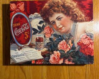 Coca-Cola jigsaw puzzle with Victorian lady and roses artwork