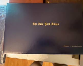 New York Times commemorative newspaper in navy presentation folder