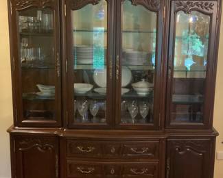 Large, illuminated china cabinet. We can sell you bottom half if you only want it.