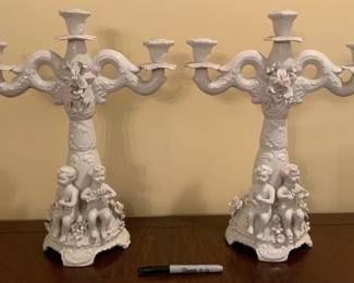 Pair of porcelain candelabra. Marked “V. Bassano.”
