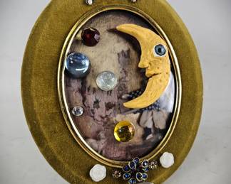 Handmade Art Assemblage Moon Man Sculpted Gems on Oval Dome Frame
