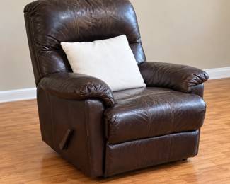 Dark Brown Recliner with Square White Pillow.  Pillow, chair sold separately 